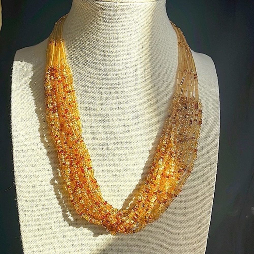 Golden seed bead multi strand necklace! Gorgeous over a T or under a collar!